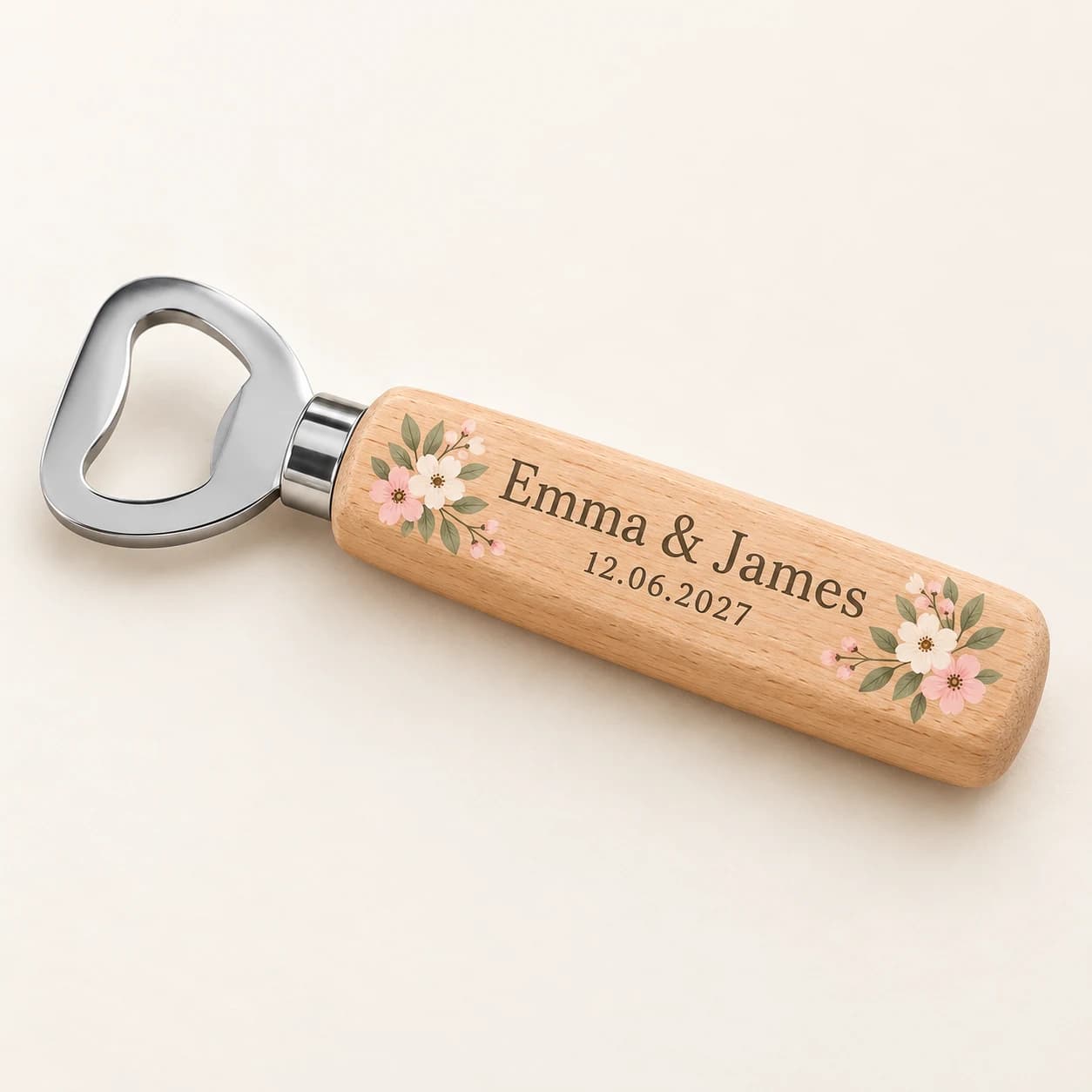 Digital product mockup of a wooden wedding bottle opener with floral artwork and personalised names.